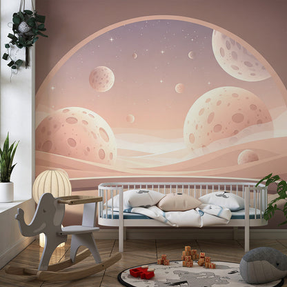 Kids-Mundo pastel moon wall mural brightening a playroom corner with soft dune-coloured tones.