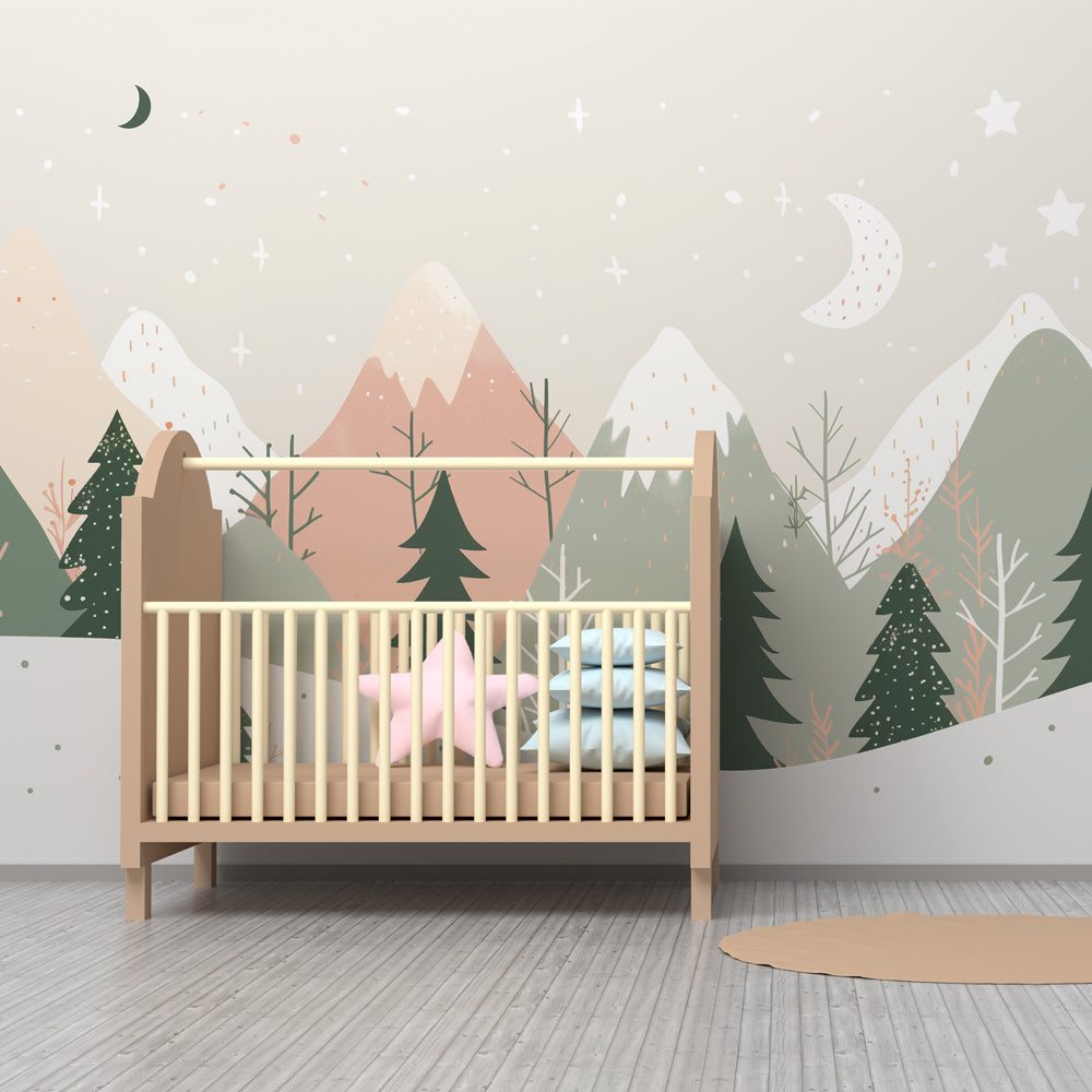 Kids-Mundo pastel mountain and forest mural styled in a playroom with moons, stars and pine trees.
