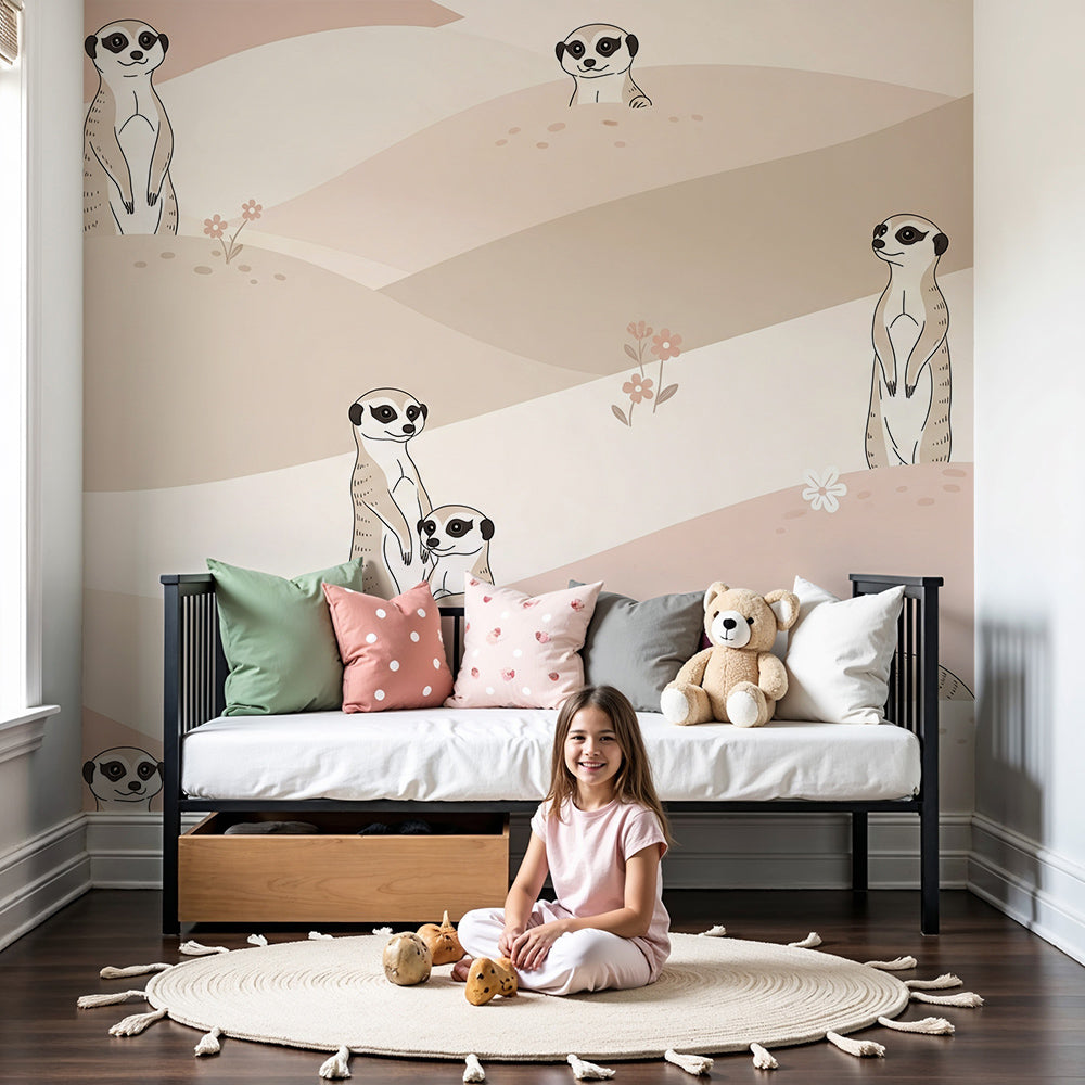 Kids-Mundo pastel meerkat wall mural styled in a soft blush nursery beside a wooden cot