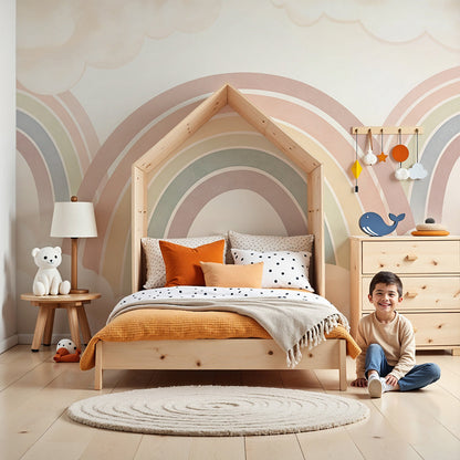 Kids-Mundo pastel rainbow and clouds wall mural covering a nursery feature wall