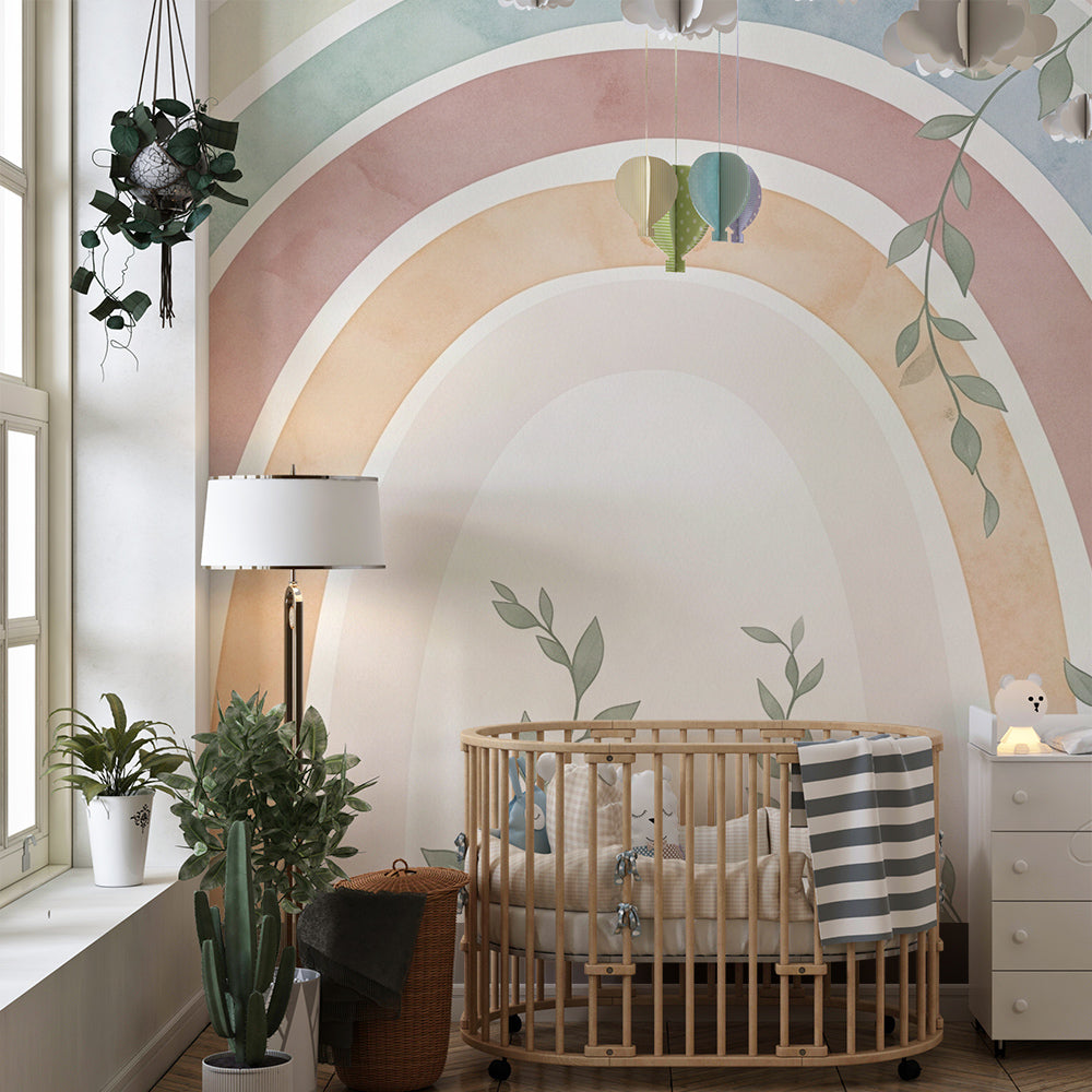 Kids-Mundo rainbow wall mural with leafy vines styled in a bright playroom corner