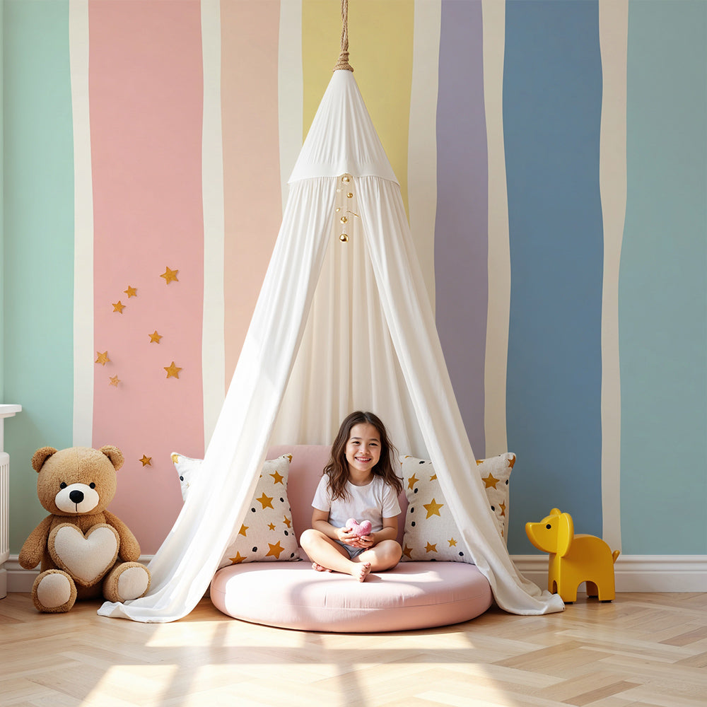 Kids-Mundo pastel rainbow stripe wall mural in a soft, sunlit nursery with a cot and rug