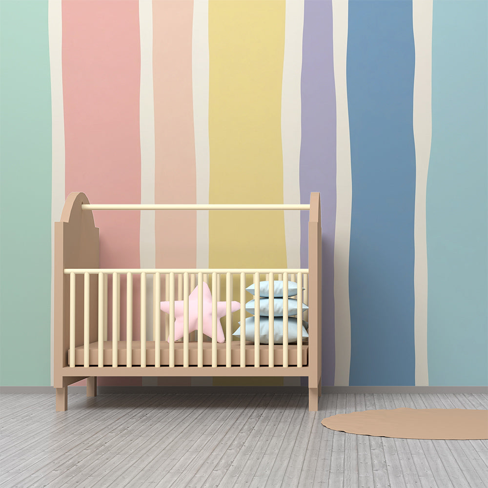 Kids-Mundo rainbow stripe wall mural brightening a colourful playroom with toys and floor cushions