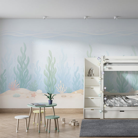 Kids-Mundo pastel underwater wall mural behind a bed in a child's bedroom