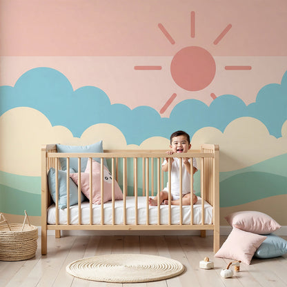 Kids-Mundo pastel sky wall mural styled behind a cot in a soft, sunlit nursery setting
