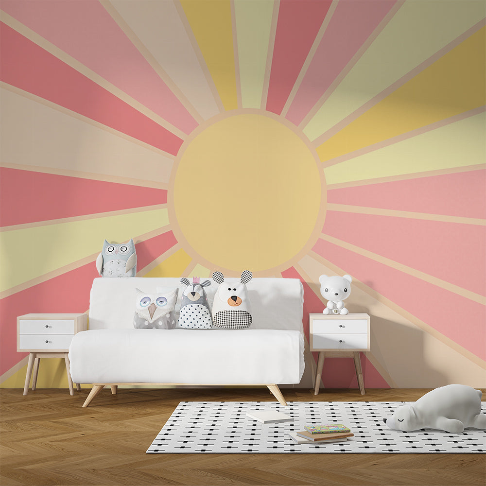 Kids-Mundo sunburst wallpaper mural in a warm pastel kids bedroom with a cosy reading nook.