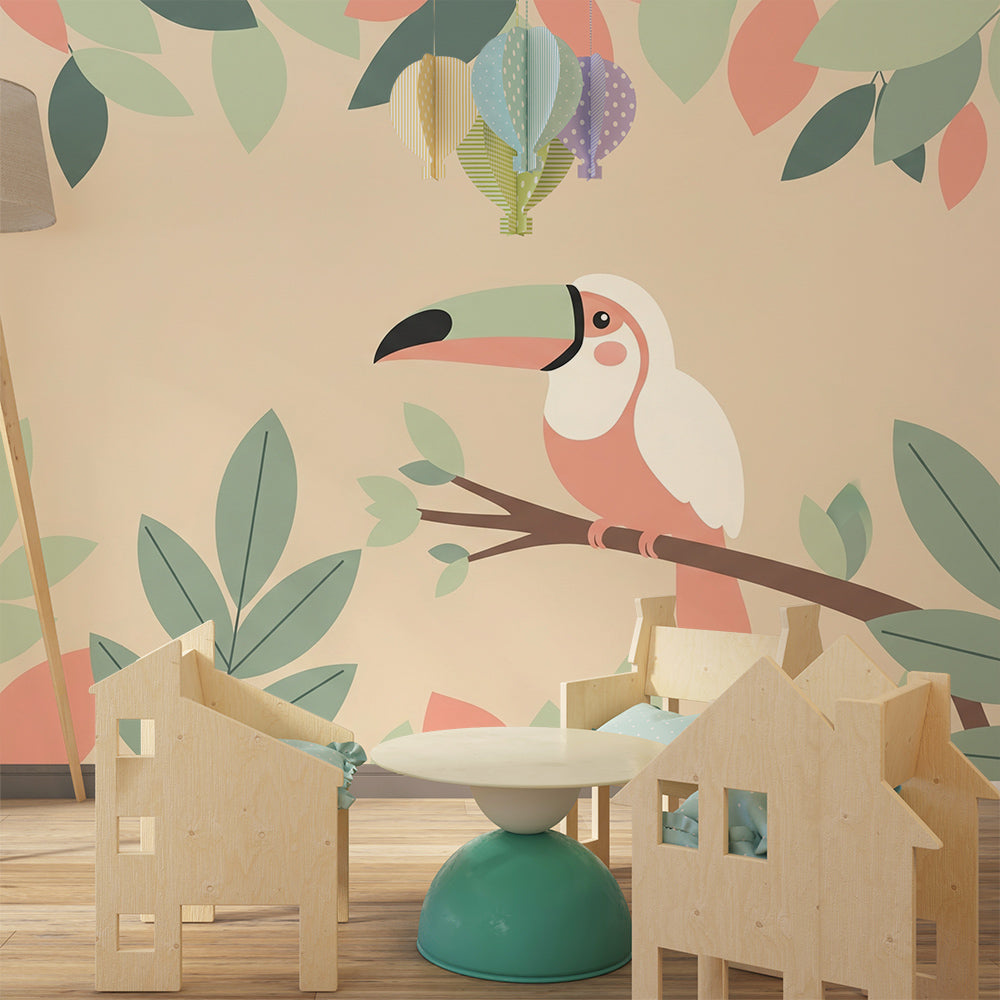 Kids-Mundo toucan wall mural in a kids' bedroom, gentle beige tones with pastel leaf branches around the bird.