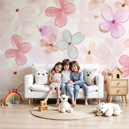 Kids-Mundo pastel watercolour floral wall mural behind a white cot in a soft nursery.