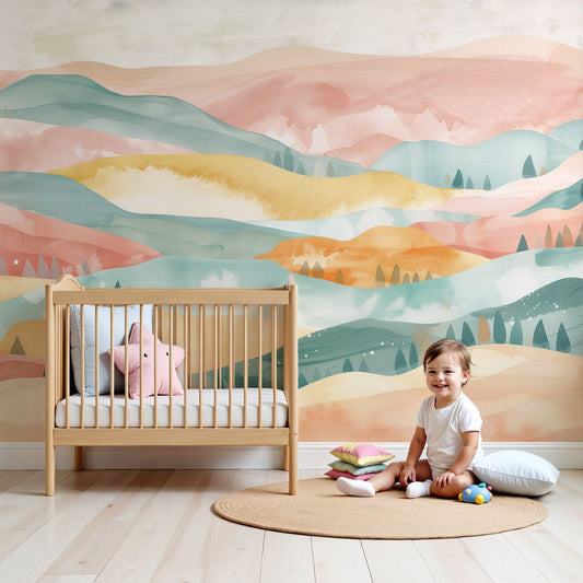 Kids-Mundo pastel watercolour hills wall mural styled in a calm nursery room