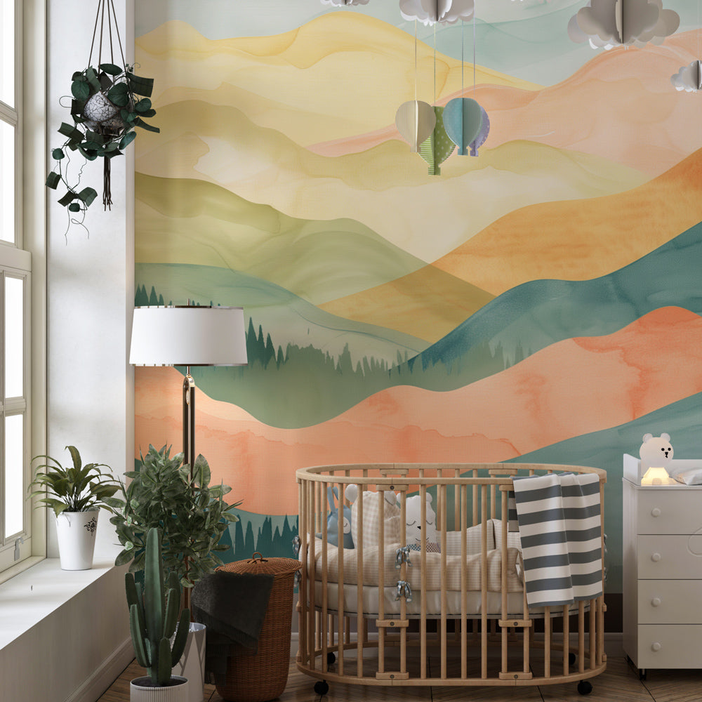 Kids-Mundo watercolour mountain wall mural bringing soft colour to a playroom wall