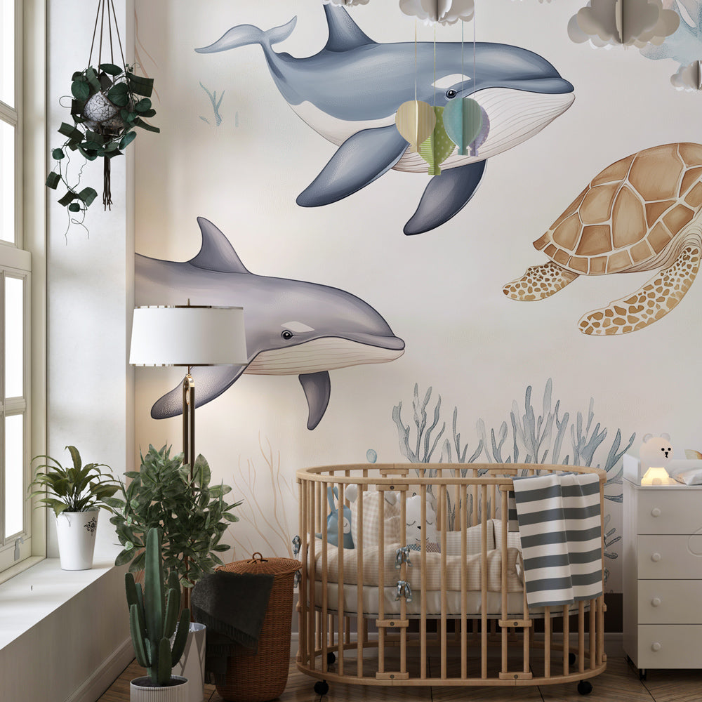 Kids-Mundo ocean wall mural with whales and a turtle covering a playroom wall