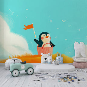 Adventure-themed penguin mural wallpaper transforming kids playroom into imaginative space