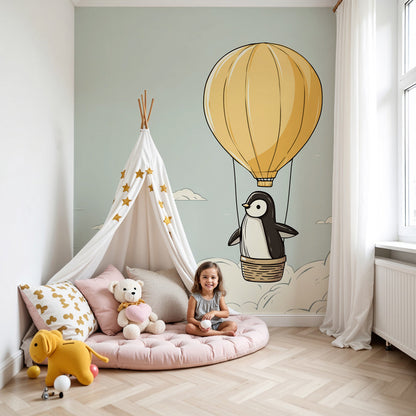 Kids-Mundo penguin hot air balloon wall mural made to measure in a soft sage-green nursery room