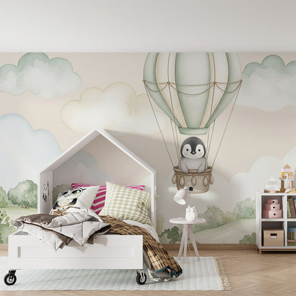 Kids-Mundo penguin hot air balloon mural brightening a calm, playful playroom wall