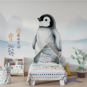 Baby penguin mural wallpaper with blue Arctic landscape for toddler room by Kids-Mundo