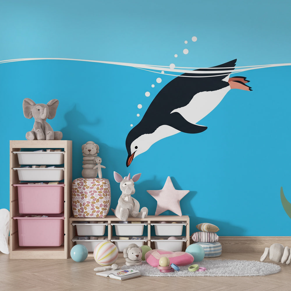 Ocean themed mural wallpaper with penguin and marine life for children's playroom by Kids-Mundo