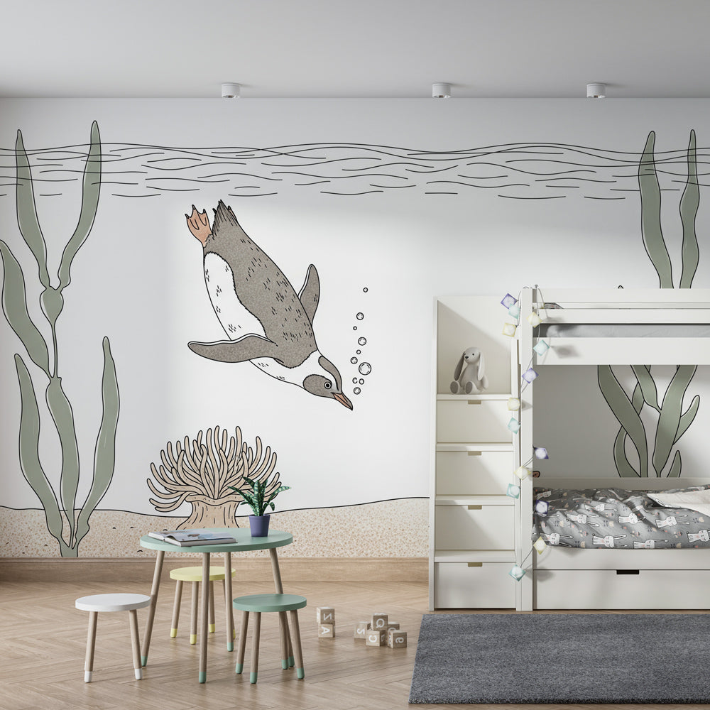 Marine life mural wallpaper with penguin and starfish creating aquatic playroom atmosphere