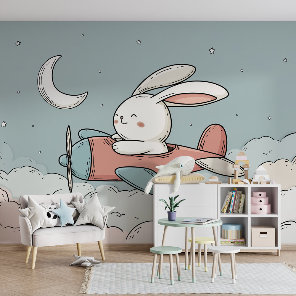 Aviation themed children's bedroom featuring bunny pilot wallpaper with clouds and stars
