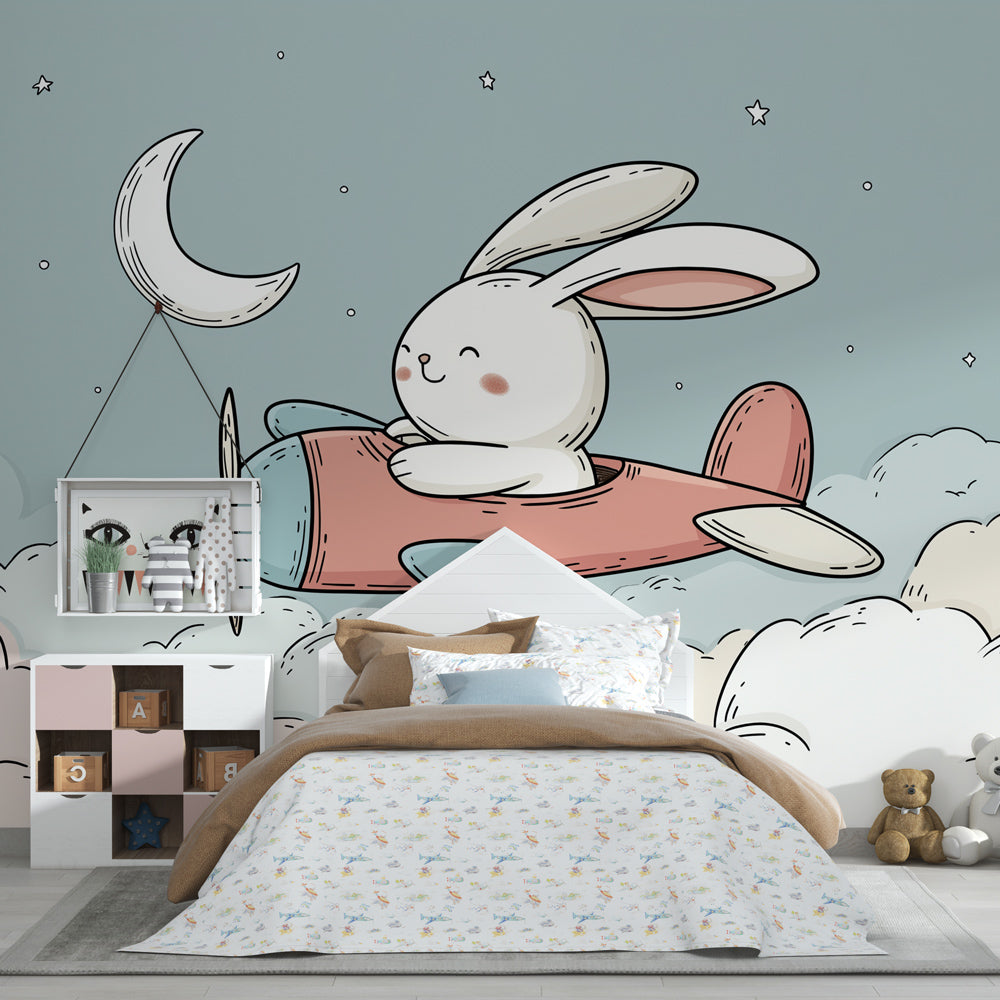 Whimsical bunny airplane mural wallpaper creating dreamy atmosphere in kids playroom