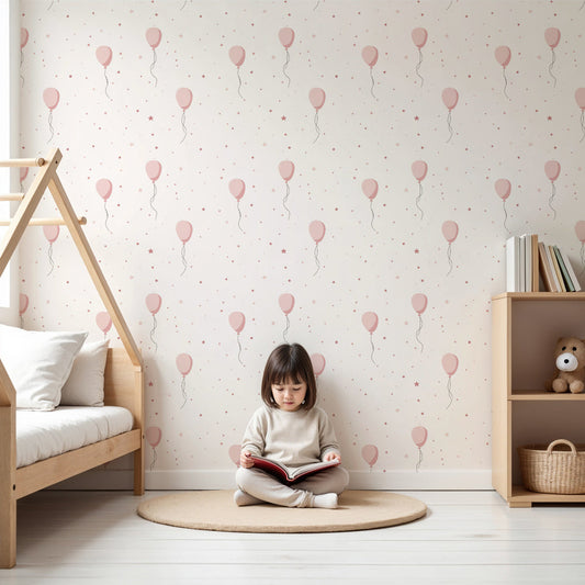 Kids-Mundo pink balloon wall mural in a soft, pastel nursery with a white cot