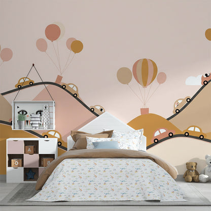 Kids-Mundo blush pink road mural styled in a kids bedroom with balloons and little cars