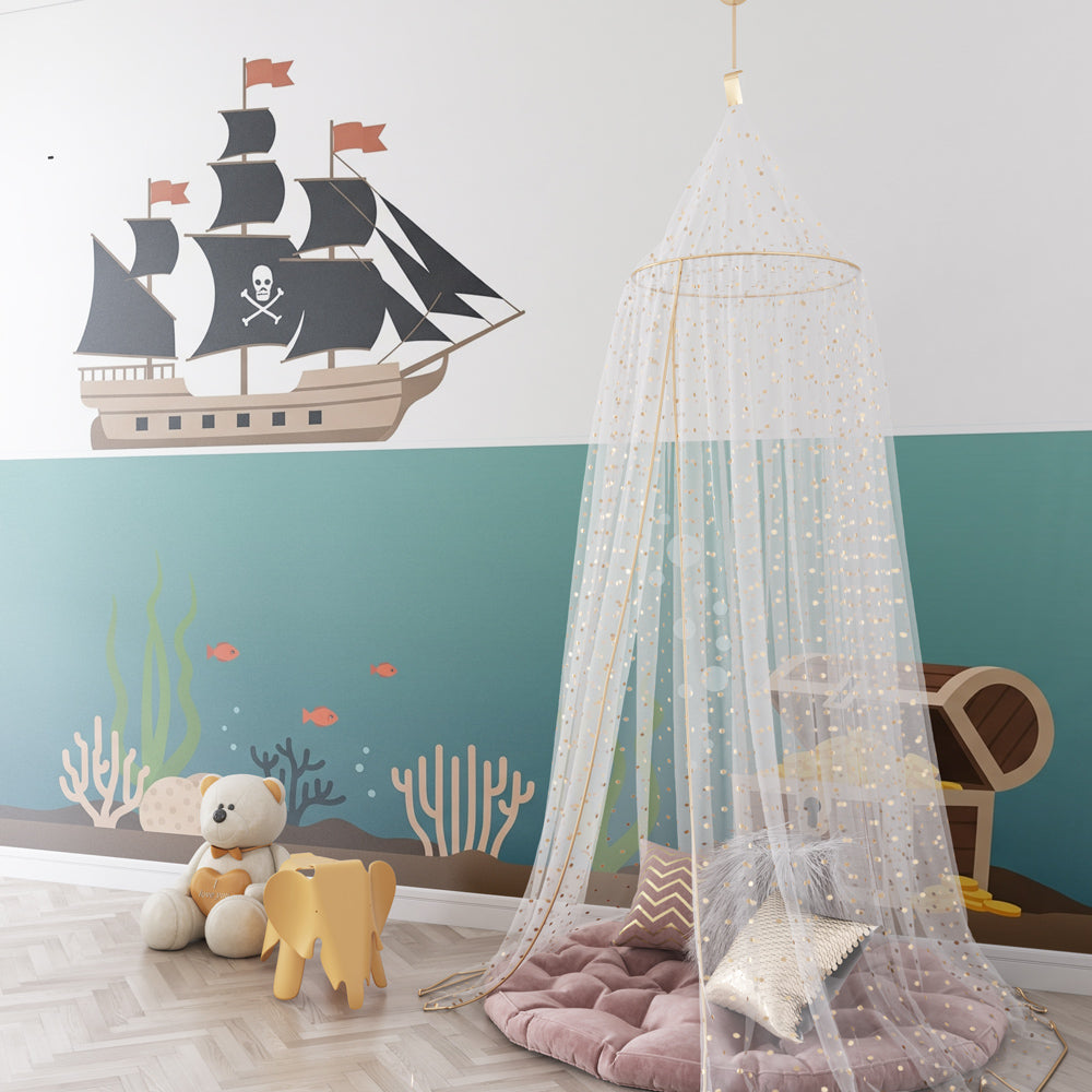 Ocean adventure mural wallpaper featuring pirate ship and marine life in colorful kids playroom