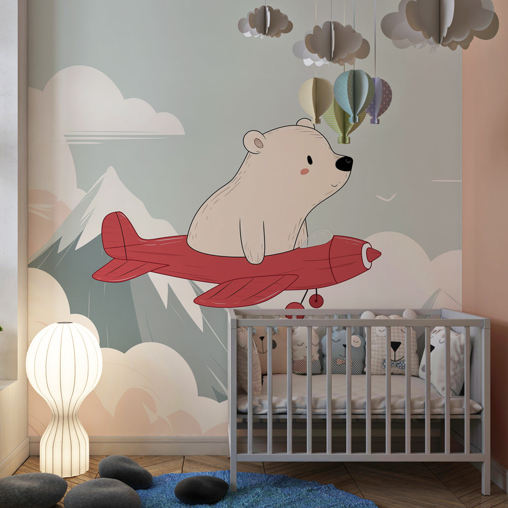 Adventure-themed polar bear mural wallpaper creating magical kids bedroom atmosphere
