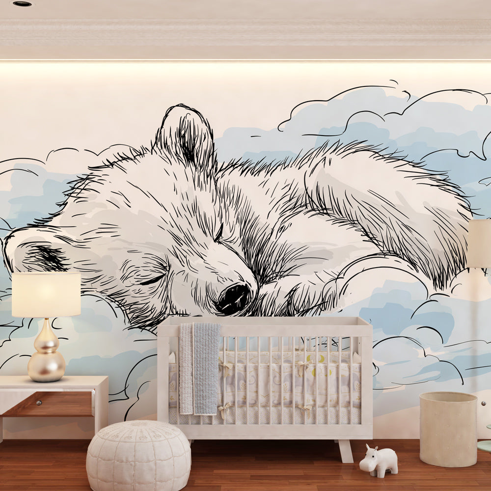 Sleeping polar bear mural wallpaper with natural wood furniture in cozy nursery setting