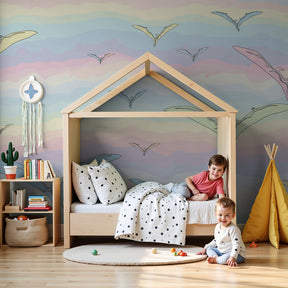 Pterosaur mural wallpaper in pastel nursery with flying dinosaurs creating peaceful kids room by Kids-Mundo