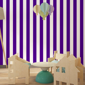 Modern purple striped wallpaper creating vibrant nursery atmosphere with white accents