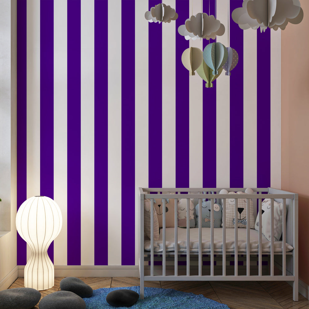 Bold purple and white striped mural wallpaper transforming children's playroom space