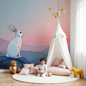 Contemplative rabbit mural wallpaper creating peaceful nursery atmosphere with sunset mountain scene by Kids-Mundo