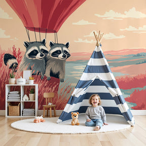 Raccoon hot air balloon mural wallpaper in modern nursery with pastel decor by Kids-Mundo