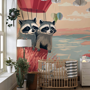 Whimsical raccoon balloon wallpaper creating magical atmosphere in kids' playroom space