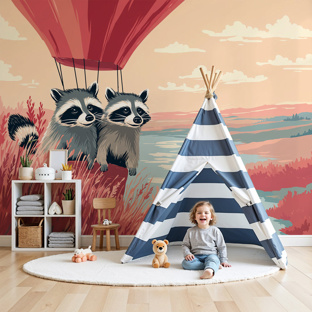 Kids-Mundo raccoon hot air balloon wall mural in a nursery with soft coral tones