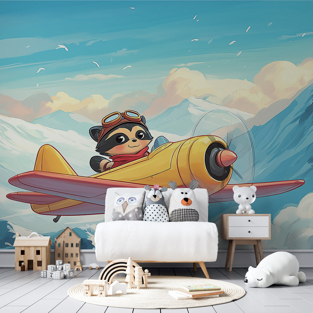 Mountain aviation themed mural wallpaper creating adventurous nursery decor with raccoon pilot