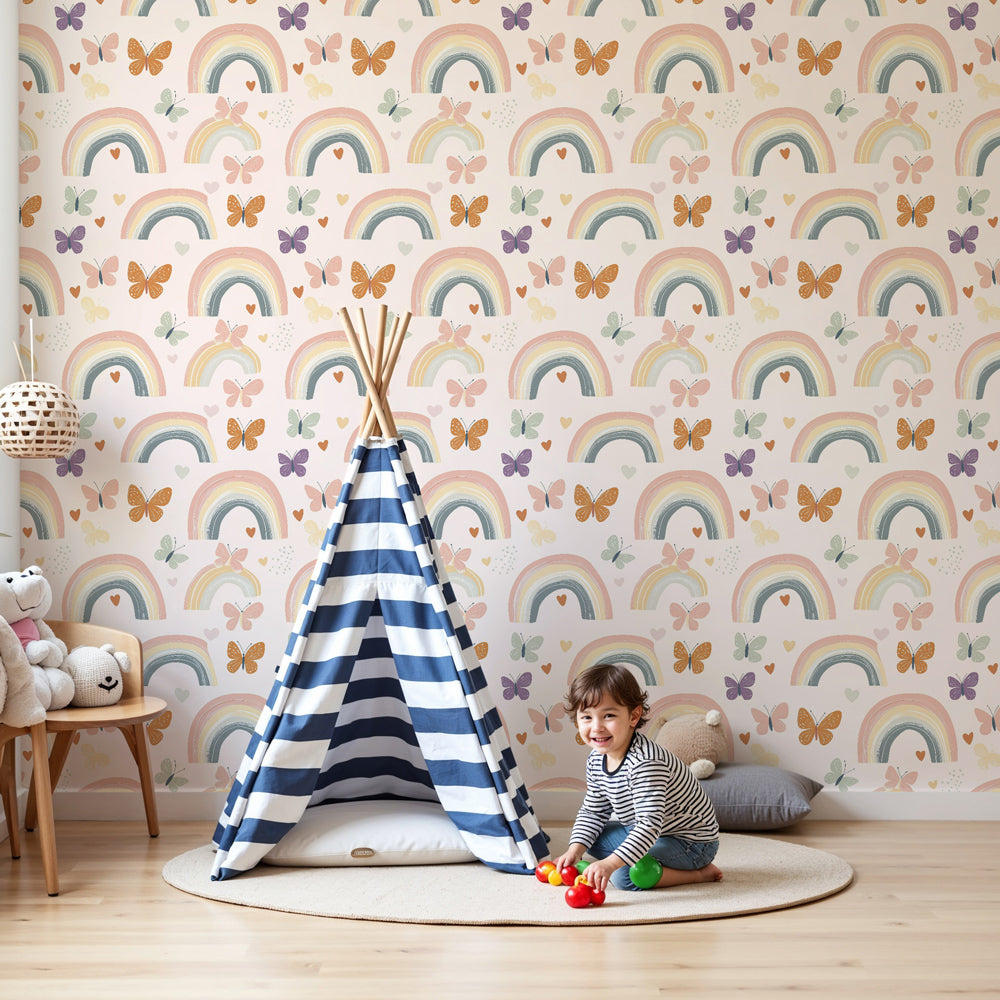 Kids-Mundo rainbow and butterfly pattern wall mural in a soft pink nursery corner