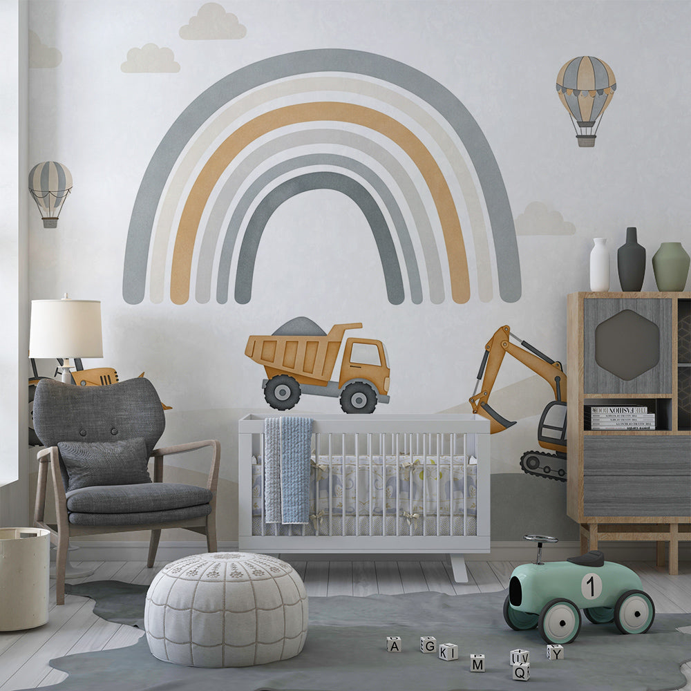 Kids-Mundo rainbow digger wall mural in a playroom with toy trucks on the floor