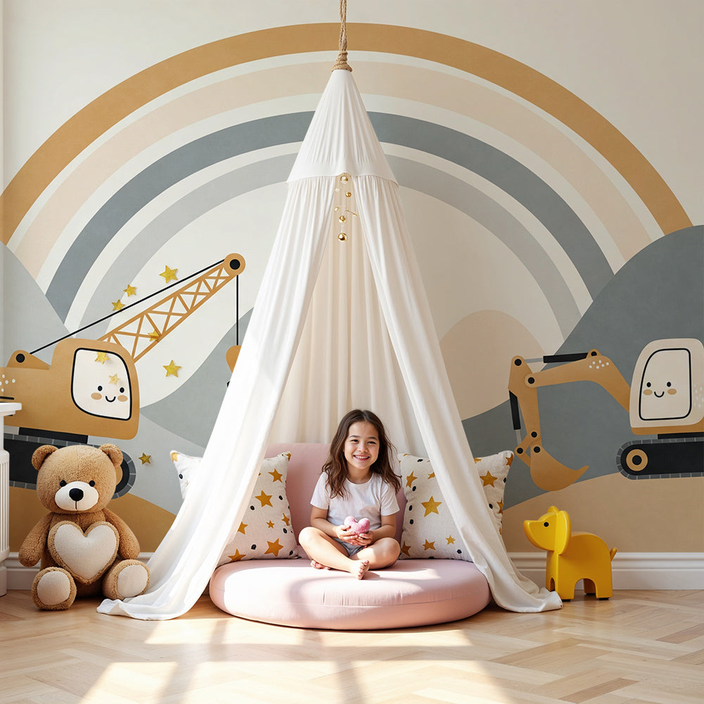 Kids-Mundo rainbow crane and digger wall mural styled in a soft neutral nursery with a cot.