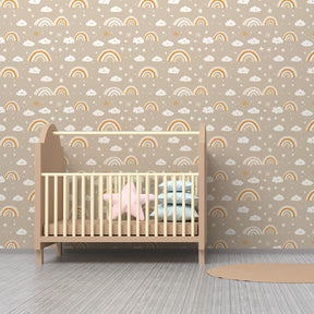 Rainbow cloud wallpaper creating magical atmosphere in children's bedroom decor
