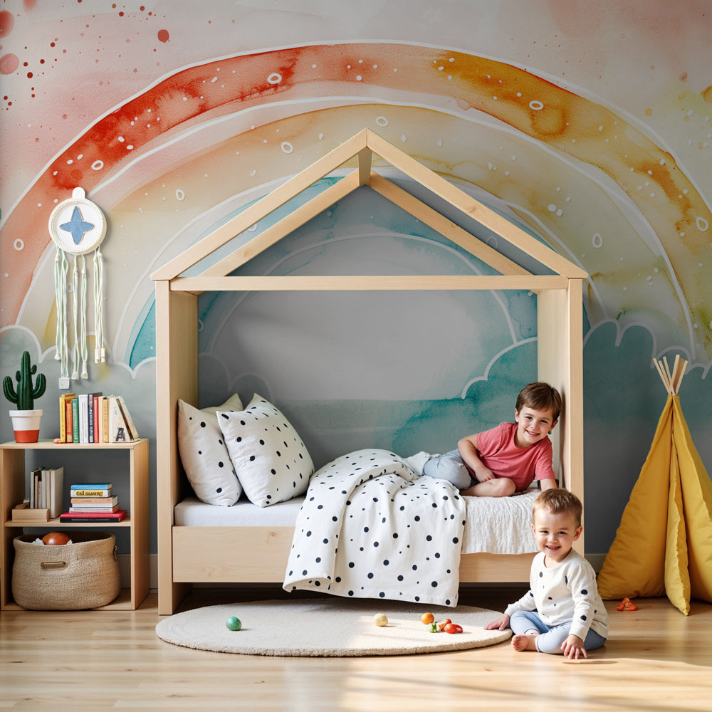 Watercolor rainbow mural wallpaper creating dreamy nursery decor with soft clouds by Kids-Mundo
