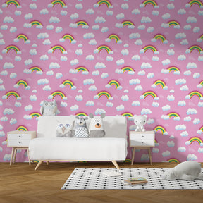 Pink rainbow mural wallpaper transforming kids playroom into dreamy space by Kids-Mundo