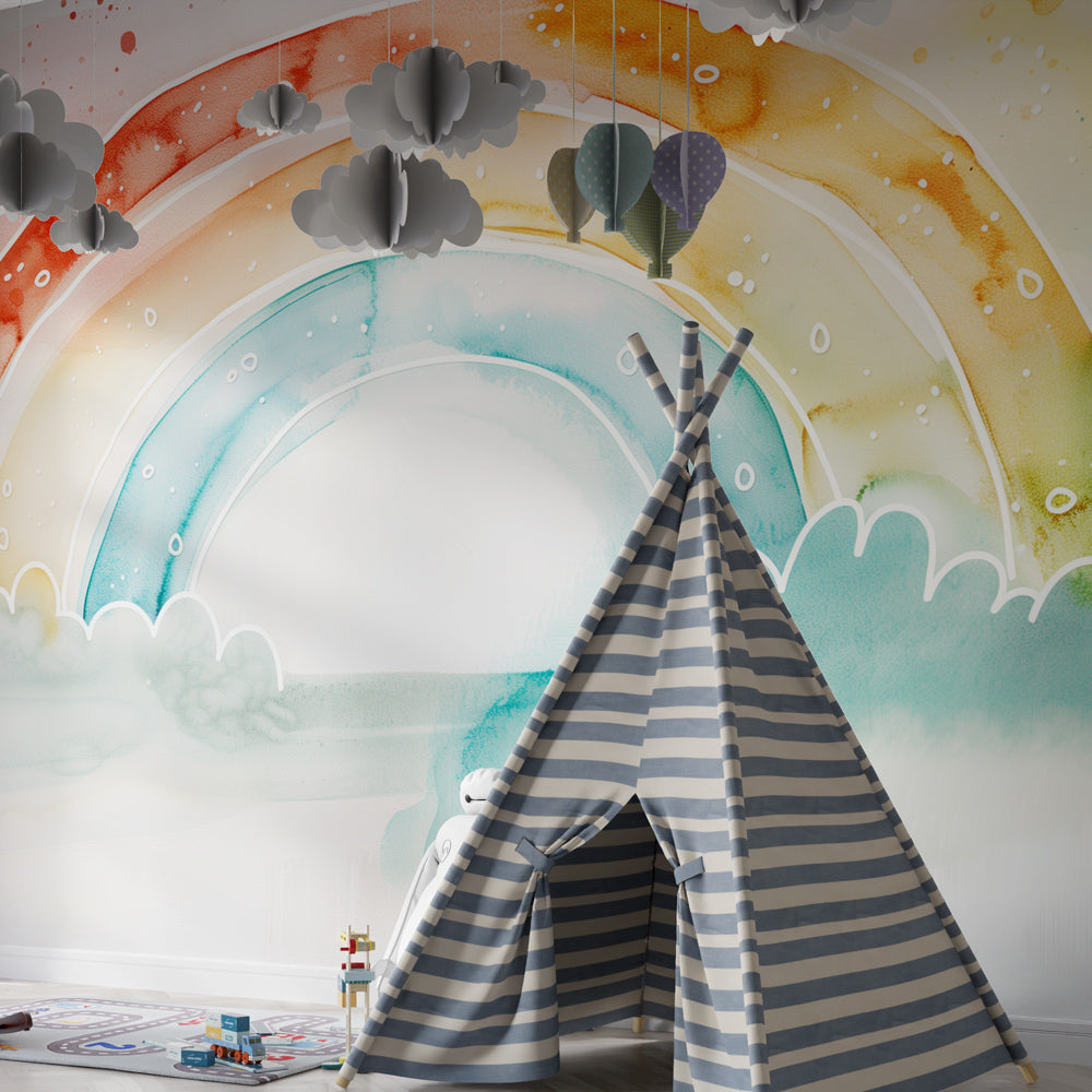 Aquarelle rainbow mural wallpaper creating serene playroom environment for kids