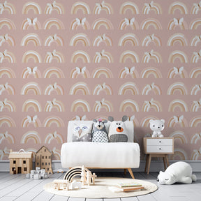 Enchanting rainbow and butterfly mural wallpaper transforming kids playroom with gentle pink tones