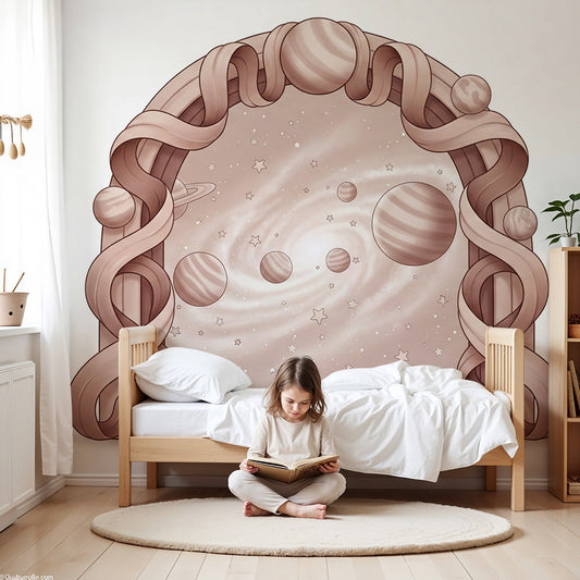 Kids-Mundo ribbon arch galaxy wall mural above a cot in a soft pink nursery.