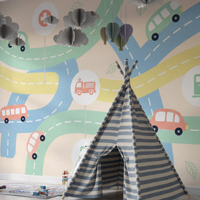 Pastel road circuit wallpaper in baby nursery with educational traffic signs
