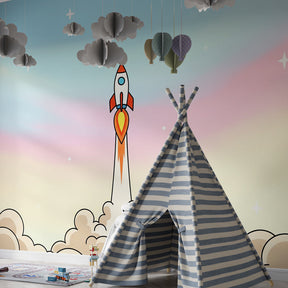 Pastel rocket mural wallpaper inspiring imagination in children's playroom setting
