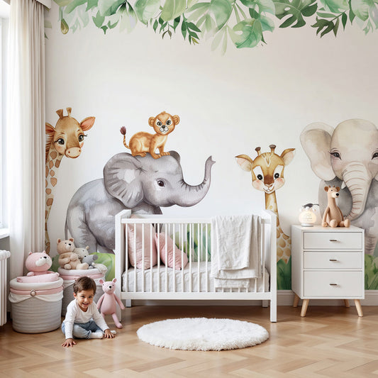 Kids-Mundo safari animals wall mural in a bright white nursery with a wooden cot and green plants.