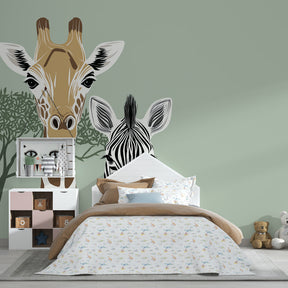Giraffe and zebra wallpaper creating peaceful safari theme in children's bedroom