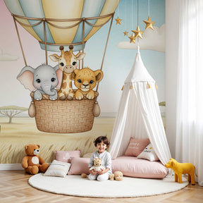 Safari animals hot air balloon mural wallpaper in bright nursery room by Kids-Mundo